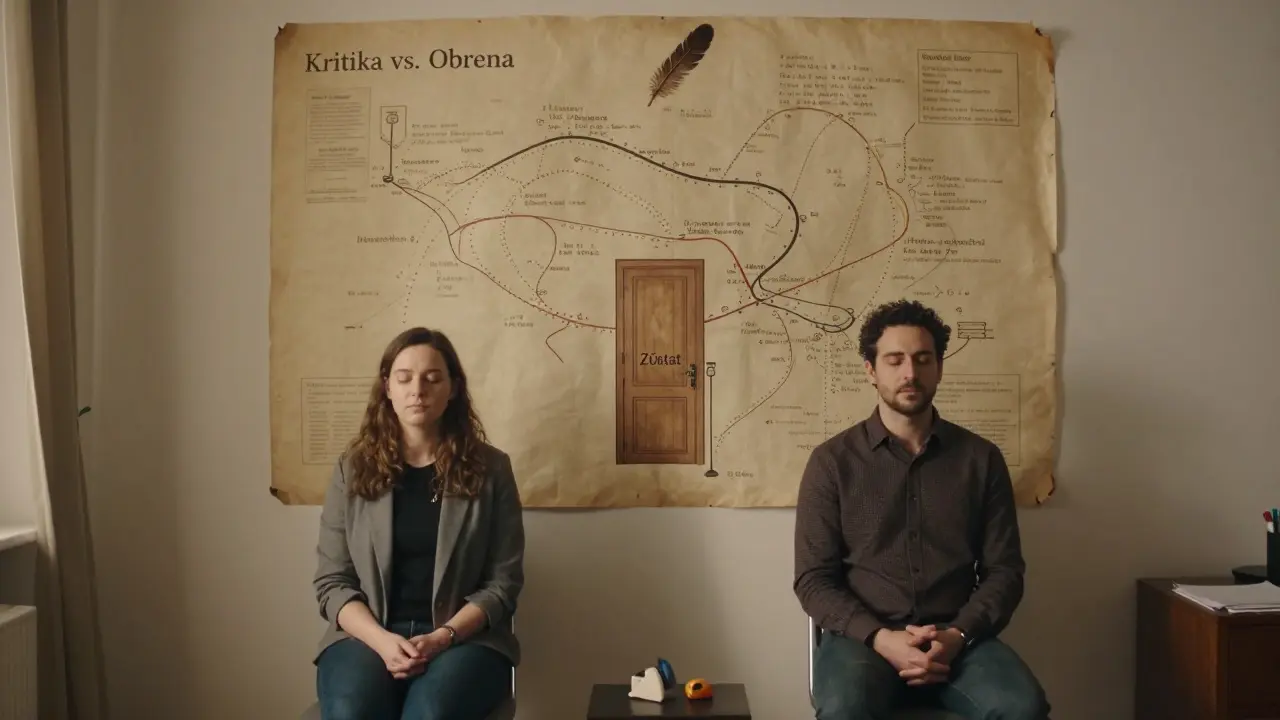 Terapeutická místnost s mapou emocí na zdi, dvojice sedí v klidu pod teplým světlem.